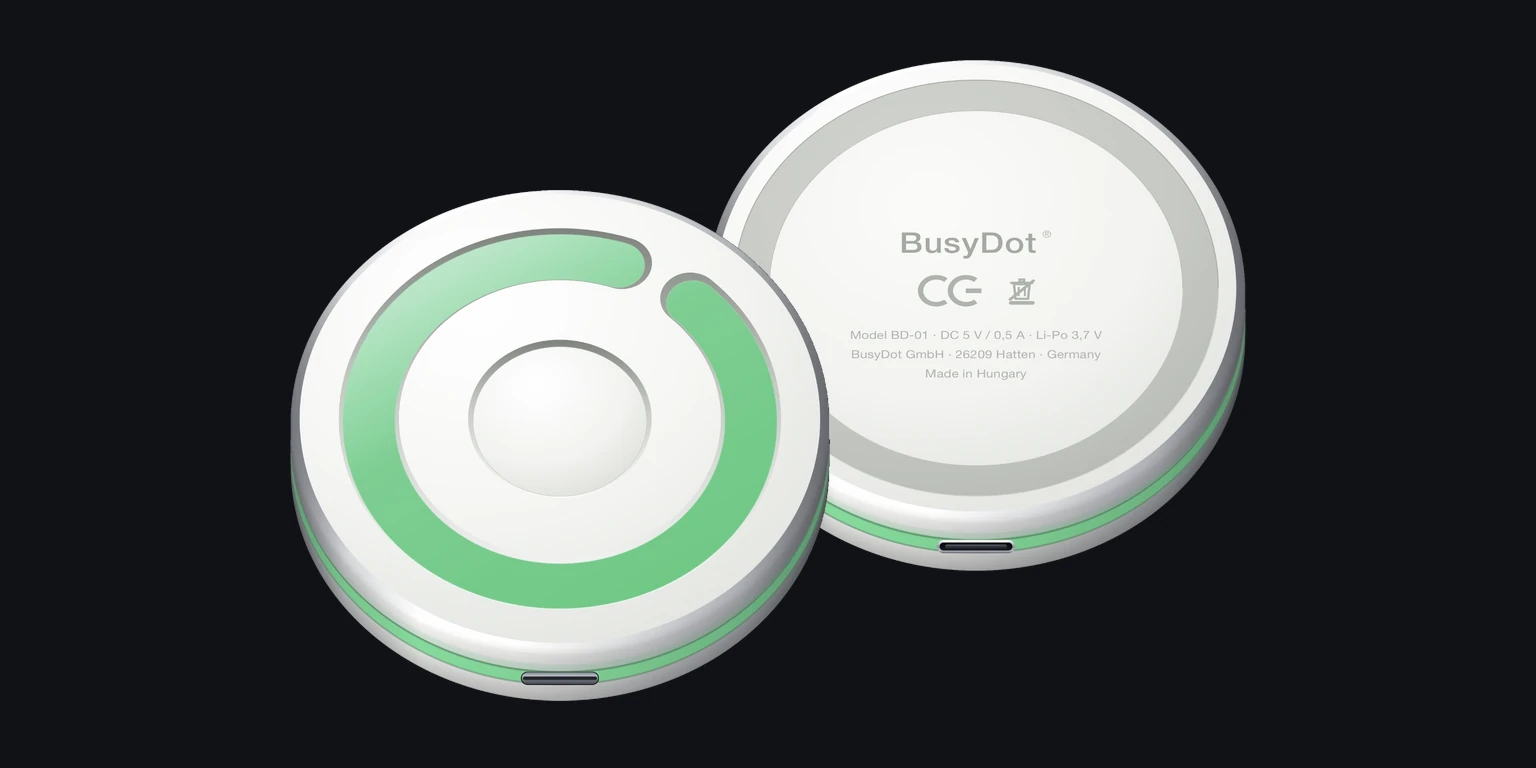 BusyDot® front and back: embossed wordmark, USB-C port and magnetic rear.